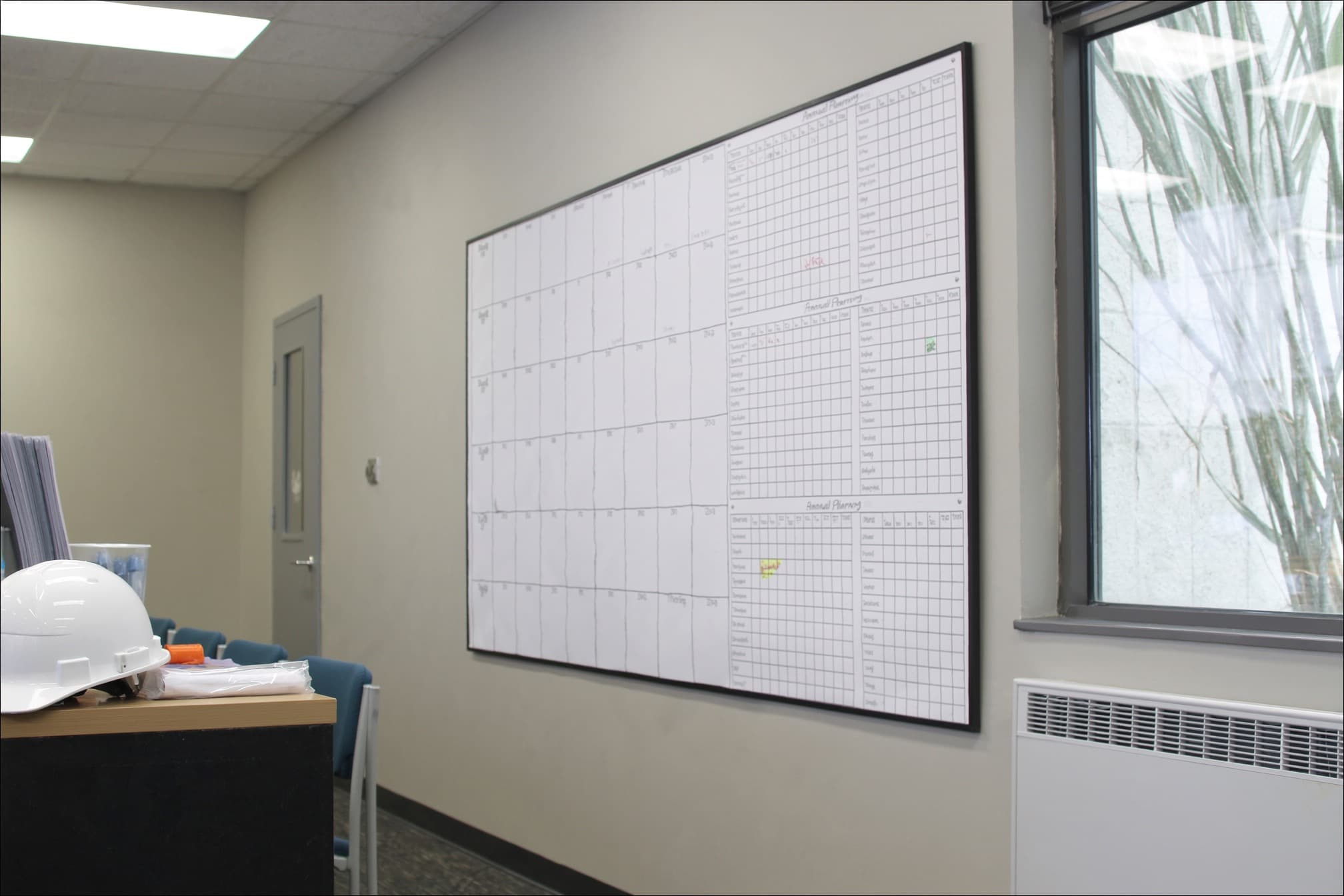 Annual maintenance program displayed in a site office